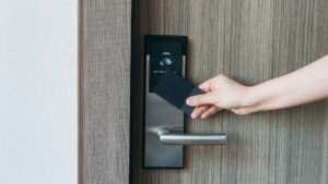Electronic card key for open door in hotel. Smart card key to lock and unlock door.